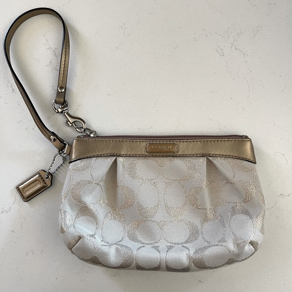 Coach Signature Print Wristlet in Champagne Gold